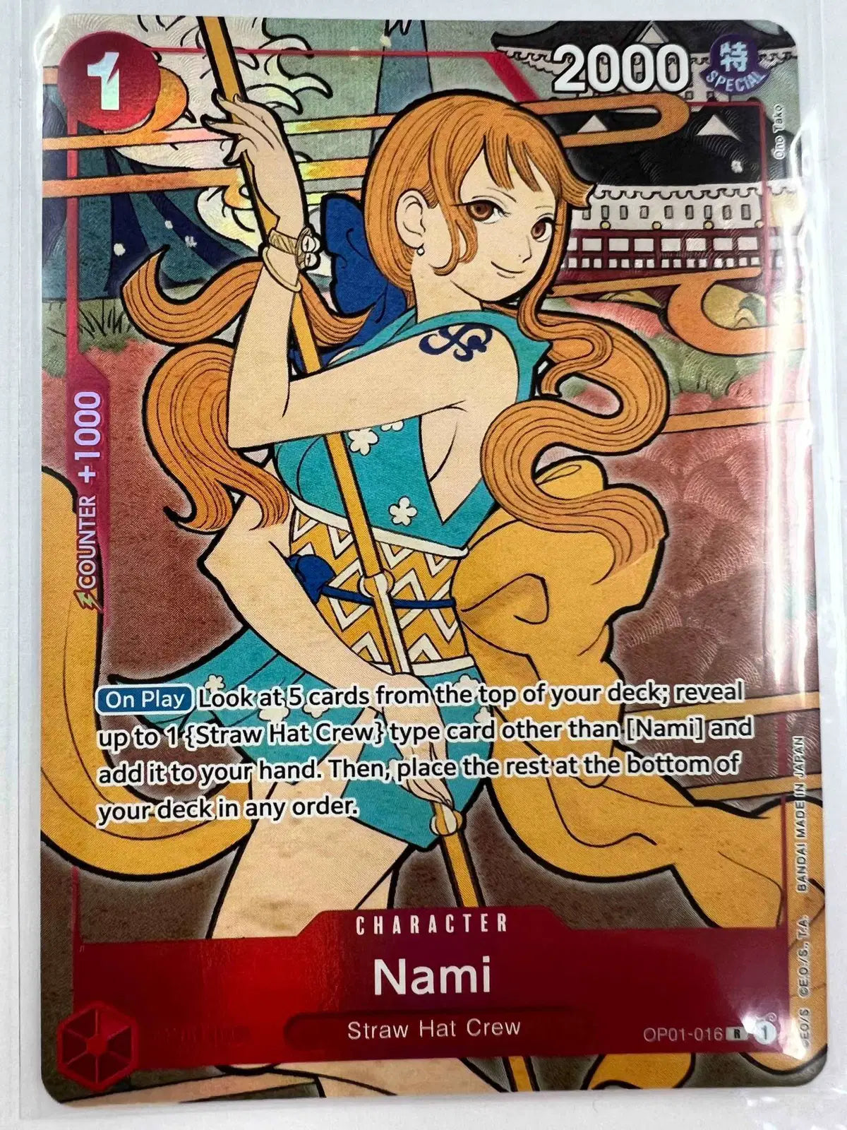 Nami (English Version 1st Anniversary Set) - OP01-016 - One Piece Promotion Cards